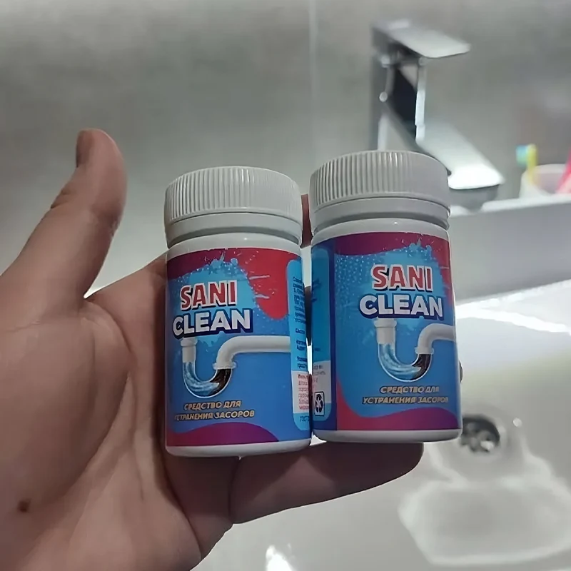 Две баночке с порошком от засоров SaniClean