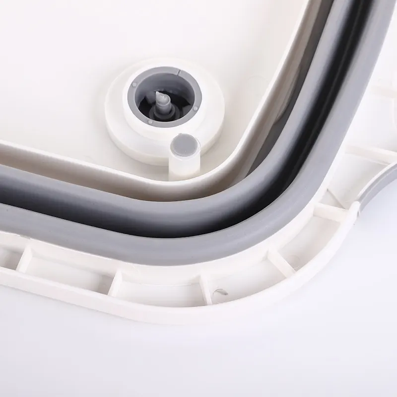 Клапан для слива воды из складной разделочной доски-контейнера с обратной стороны