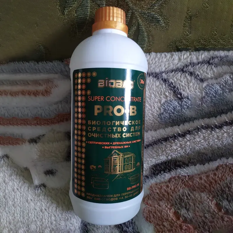Бутылка средства для септиков