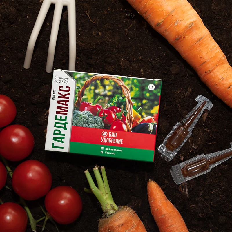 Упаковка удобрения Гардемакс, капсулы и овощи на земле